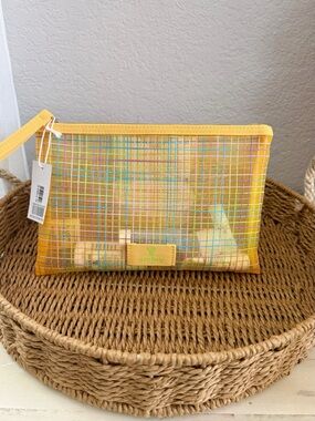 Sisley Pink and Yellow Travel Skincare Set in Grid Pouch